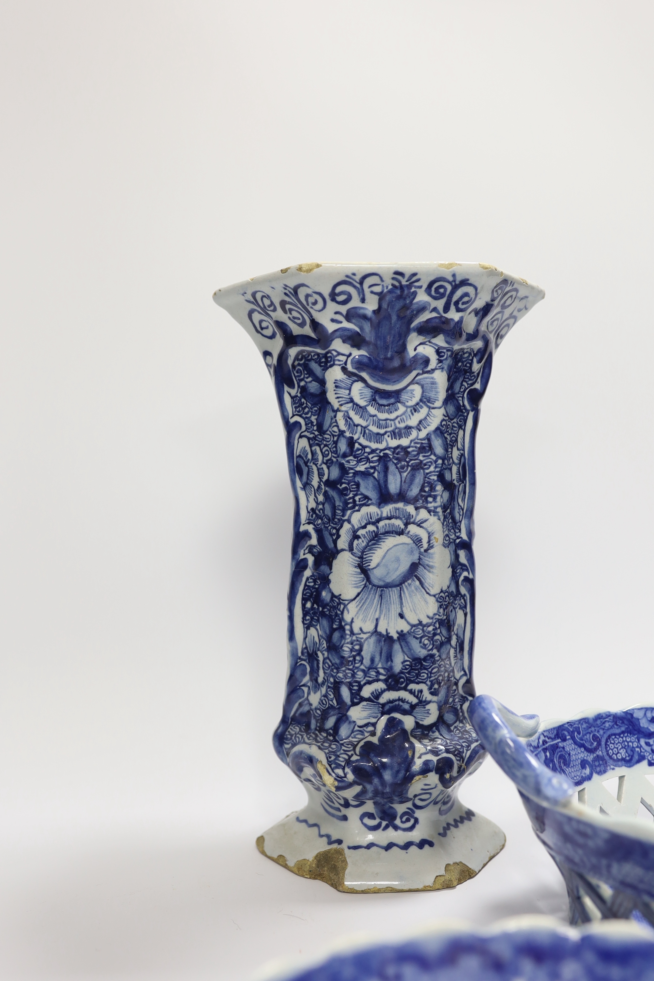 An 18th century hexagonal Delft vase, two pearlware blue and white baskets and a similar dish, tallest 27cm